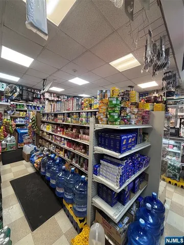 a bedroom with a bed and a table