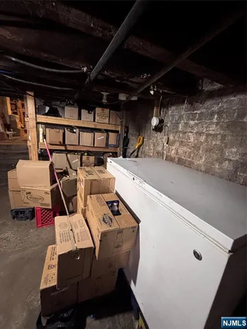 a kitchen with stainless steel appliances granite countertop a refrigerator sink and cabinets