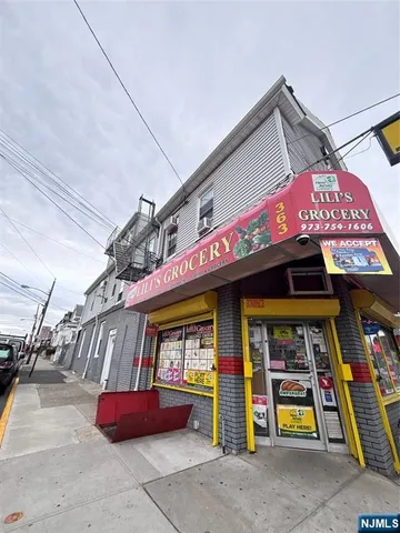 a view of a street with cars