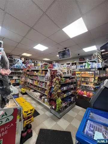 a view of a hallway with stairs