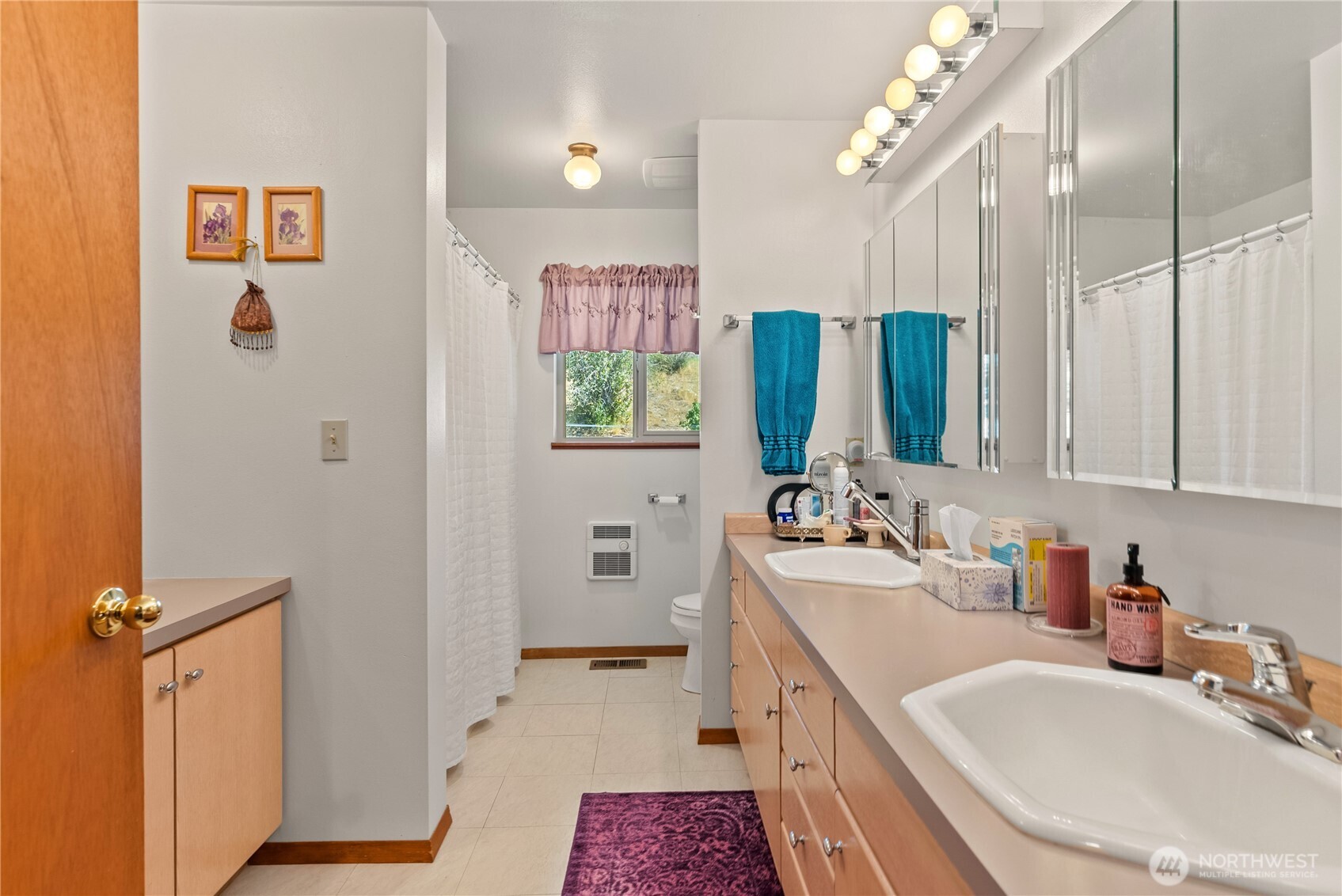 54 B Ross Road, Unit B Twisp, WA 98856 - Photo 15 of 40 a bathroom with a double vanity sink mirror and double