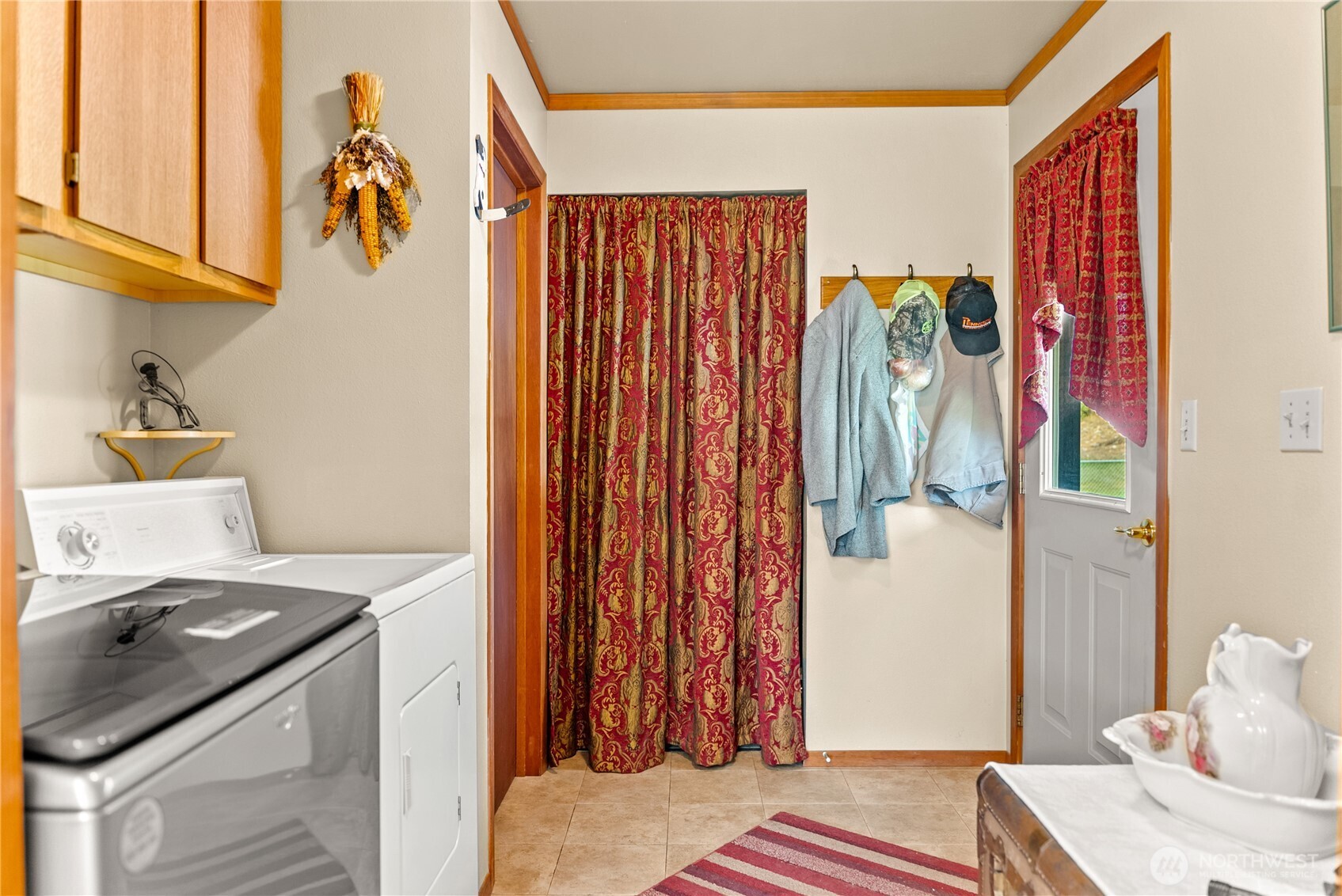 54 B Ross Road, Unit B Twisp, WA 98856 - Photo 21 of 40 a bedroom with a bed and a window