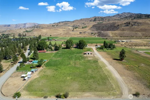 a view of a swimming pool with a yard