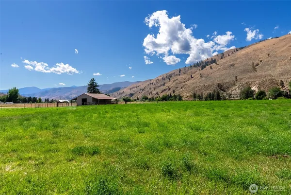 a view of a building with a big yard