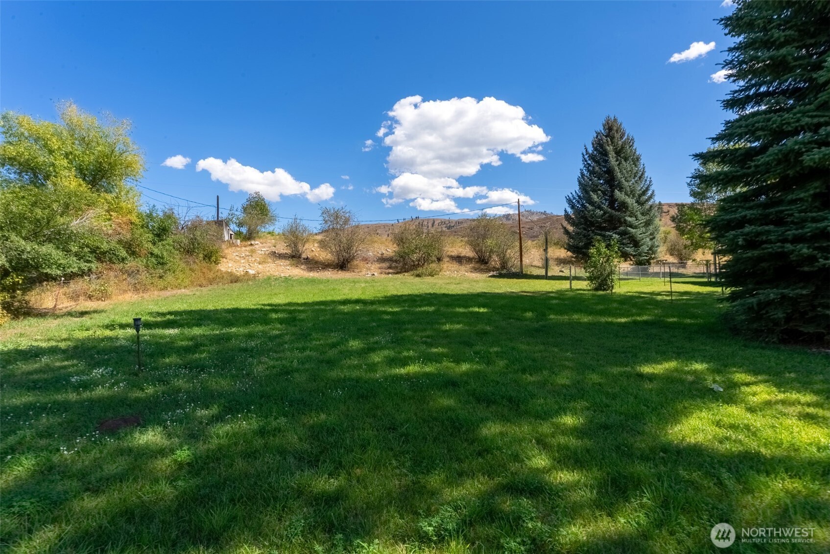 54 B Ross Road, Unit B Twisp, WA 98856 - Photo 34 of 40 a view of a big yard