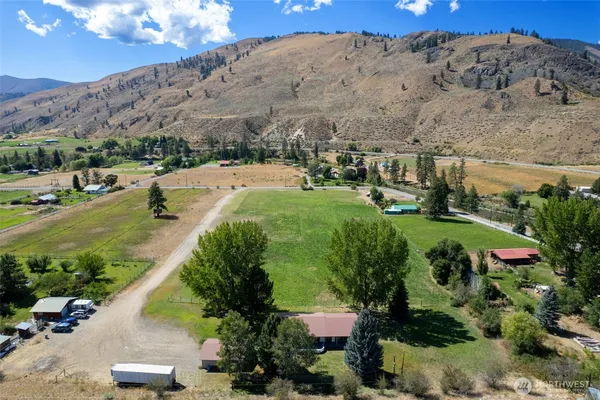 a view of a backyard with mountain view
