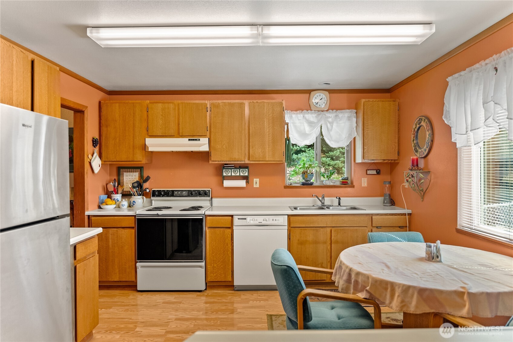 54 B Ross Road, Unit B Twisp, WA 98856 - Photo 7 of 40 a kitchen with stainless steel appliances granite countertop a stove a refrigerator and a stove