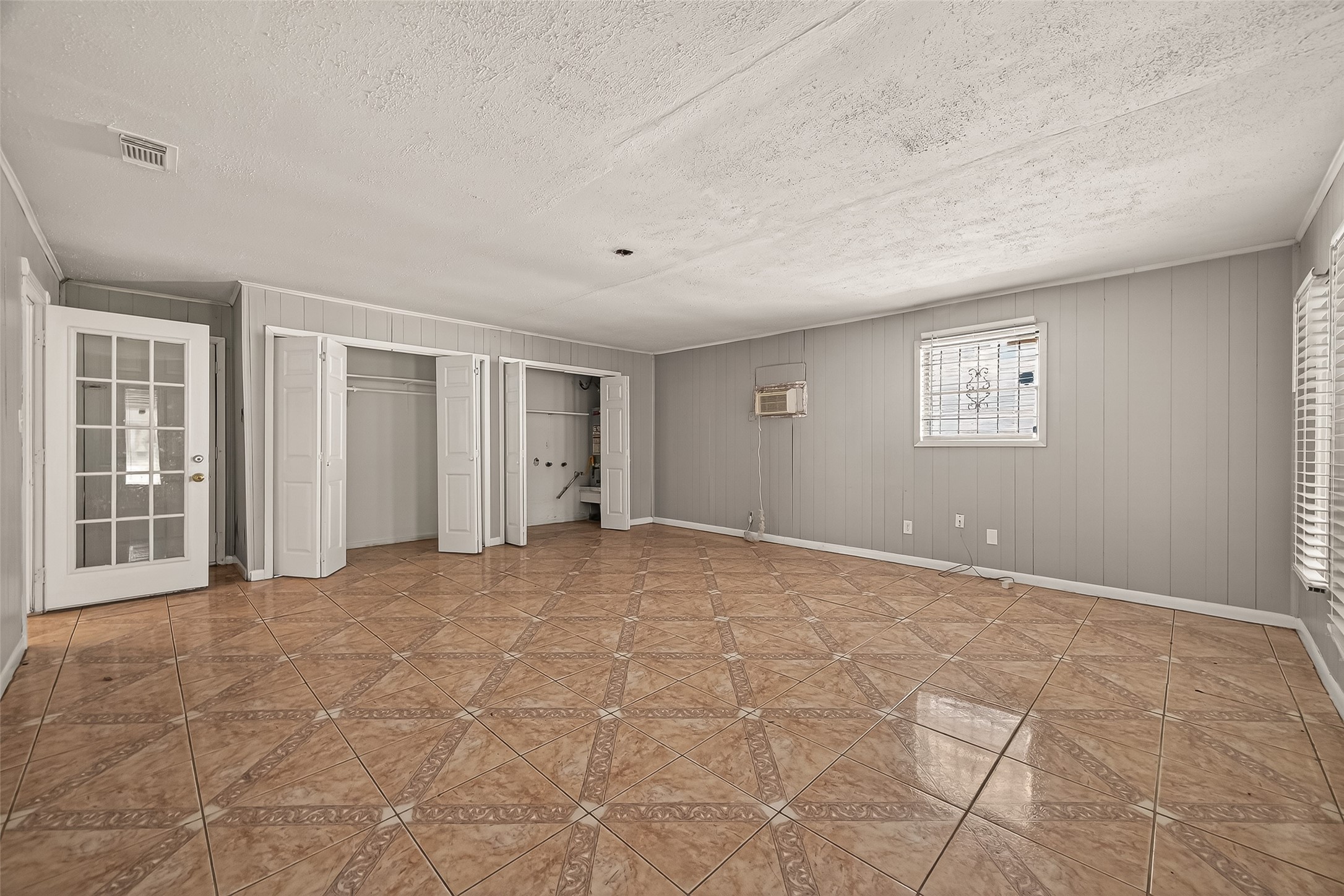 10607 Bainbridge Street Houston, TX 77016 - Photo 32 of 43 a view of an empty room with a window
