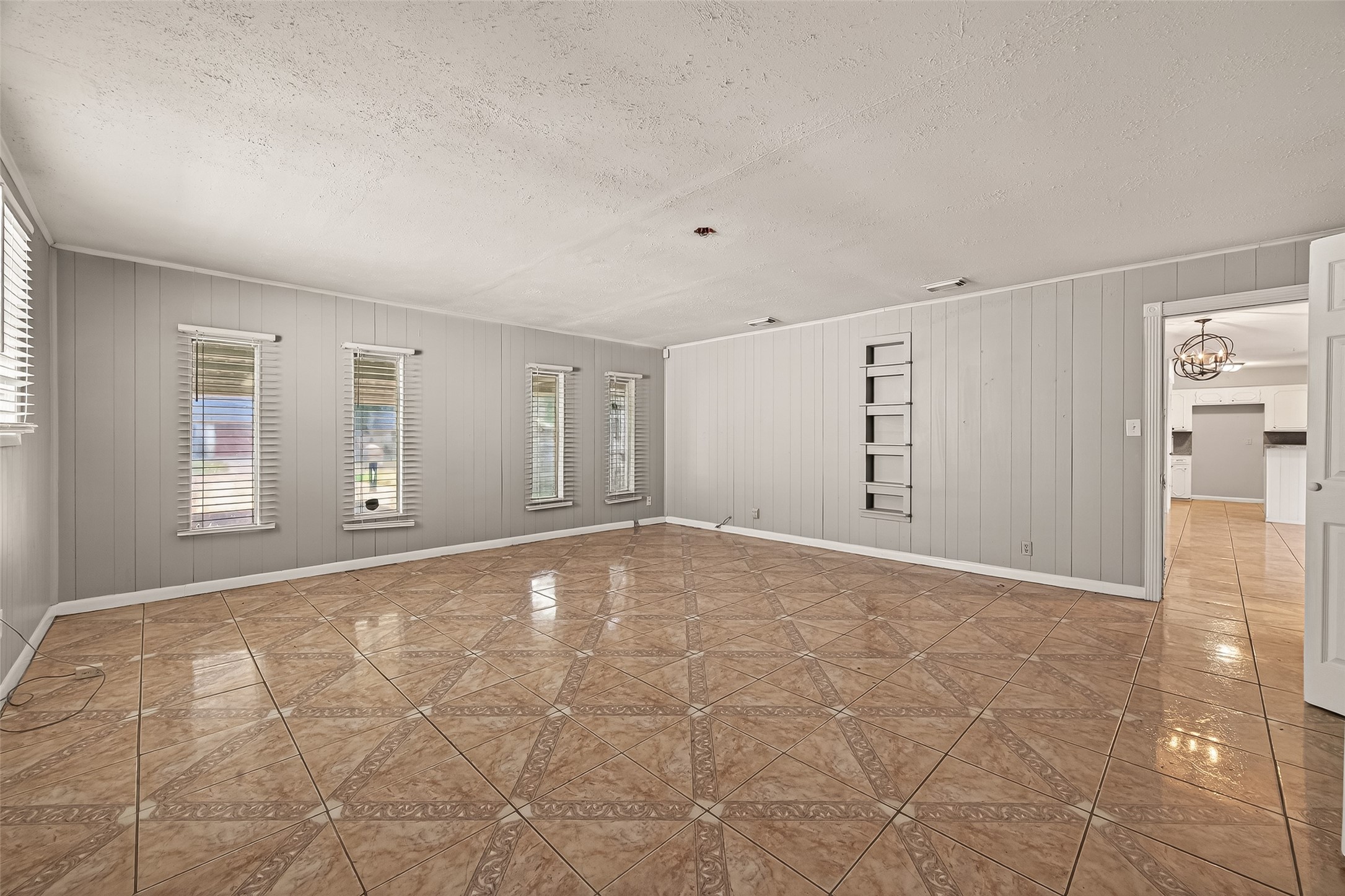 10607 Bainbridge Street Houston, TX 77016 - Photo 34 of 43 a view of an empty room with a window