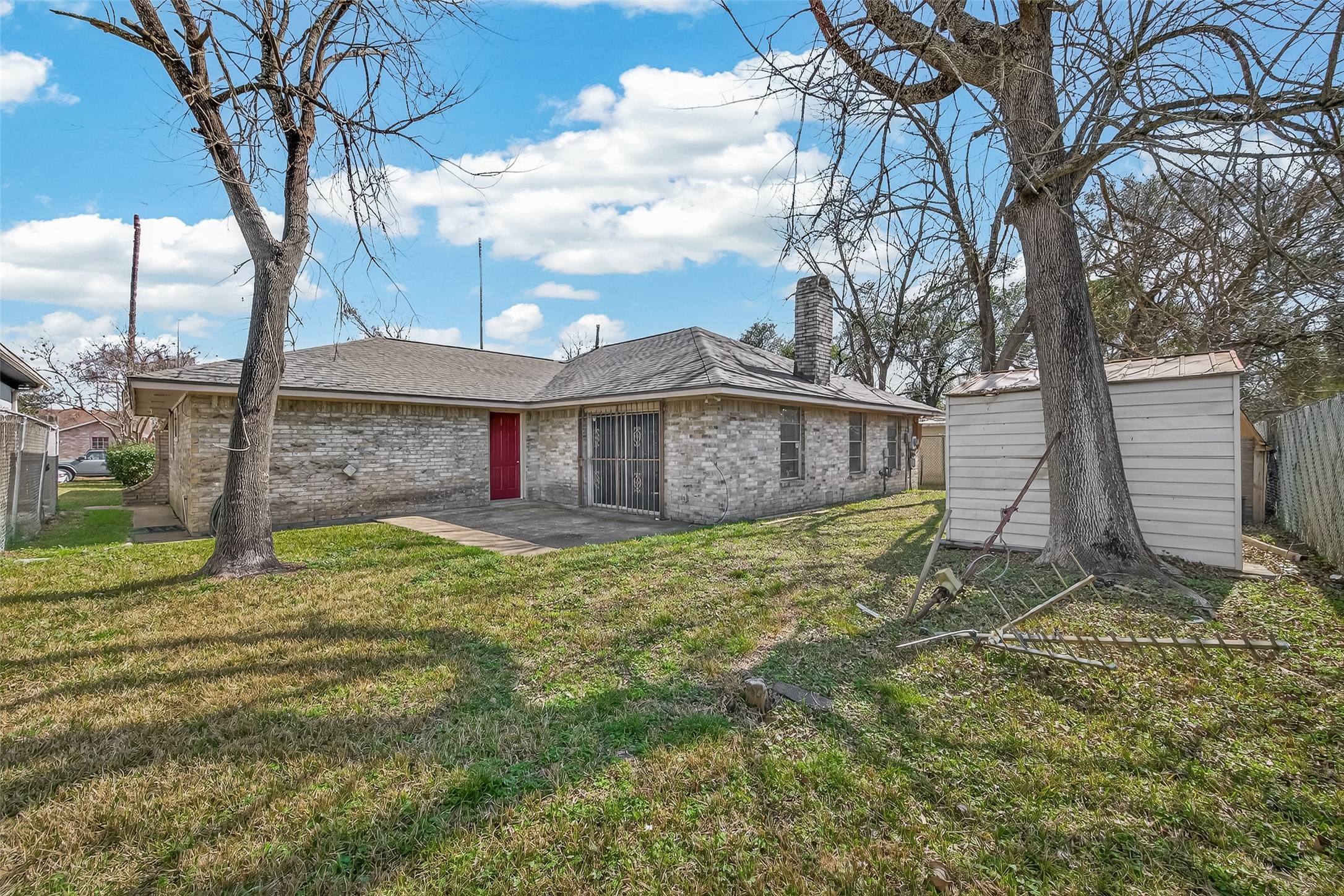 10607 Bainbridge Street Houston, TX 77016 - Photo 42 of 43 a view of a house with a yard