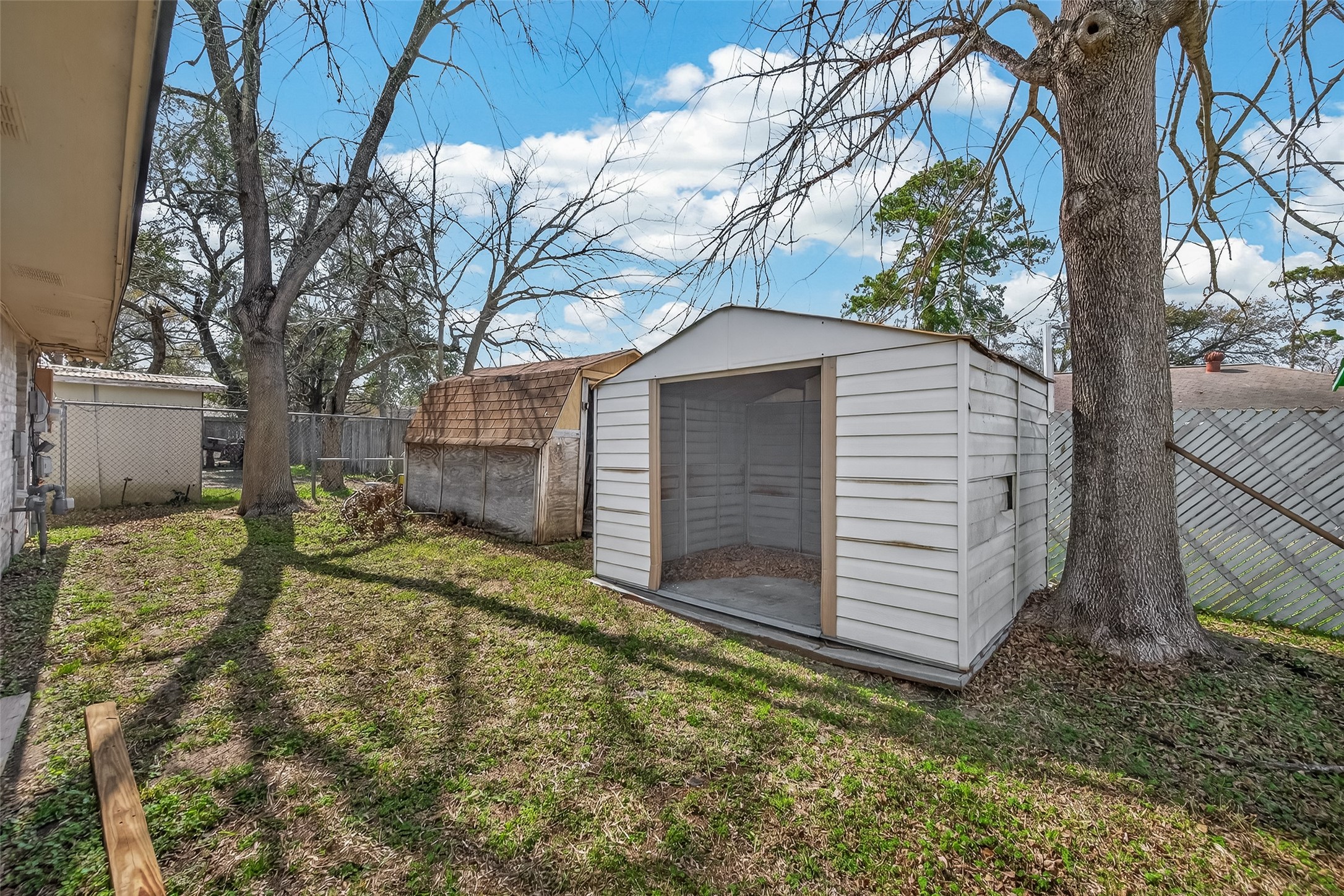 10607 Bainbridge Street Houston, TX 77016 - Photo 43 of 43 a view of a house with a yard
