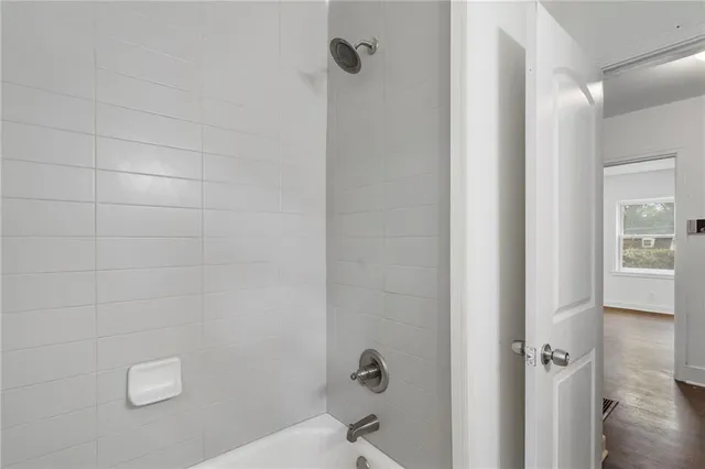 a bathroom with a bathtub