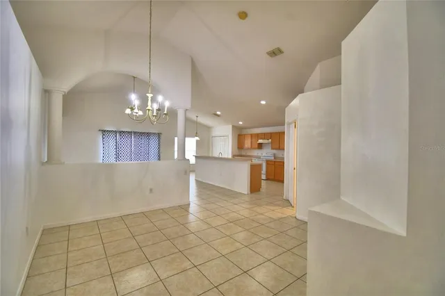 a view of kitchen and chandelier
