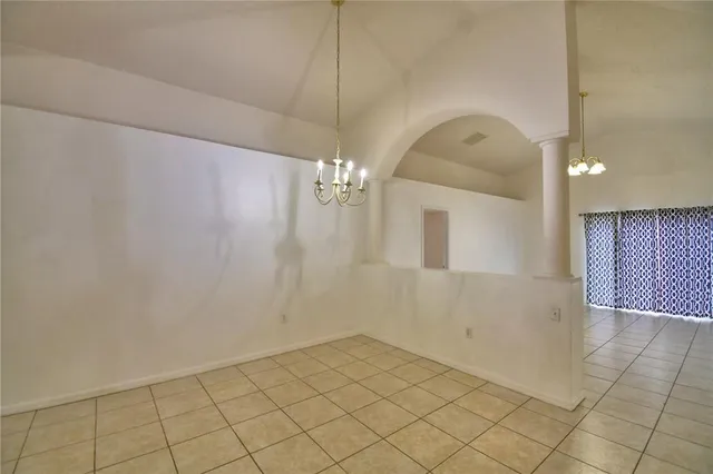 a view of a hallway with an empty room