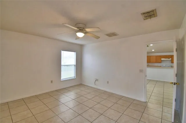 a view of an empty room and window