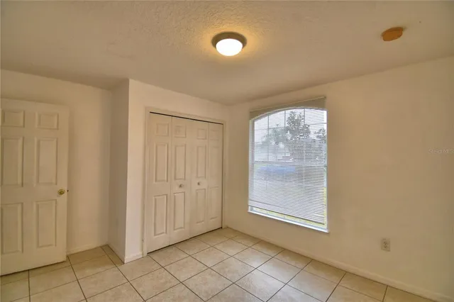a view of an empty room with window