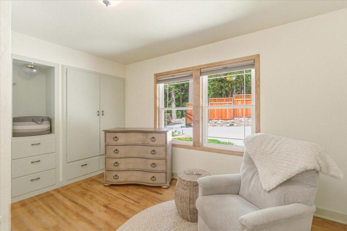 609 Eiler Road Mount Shasta, CA 96067 - Photo 14 of 35 a bedroom with a bed and a window