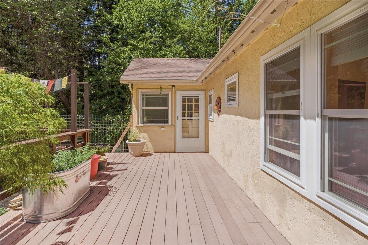 609 Eiler Road Mount Shasta, CA 96067 - Photo 27 of 35 a view of a house with backyard porch and wooden floor