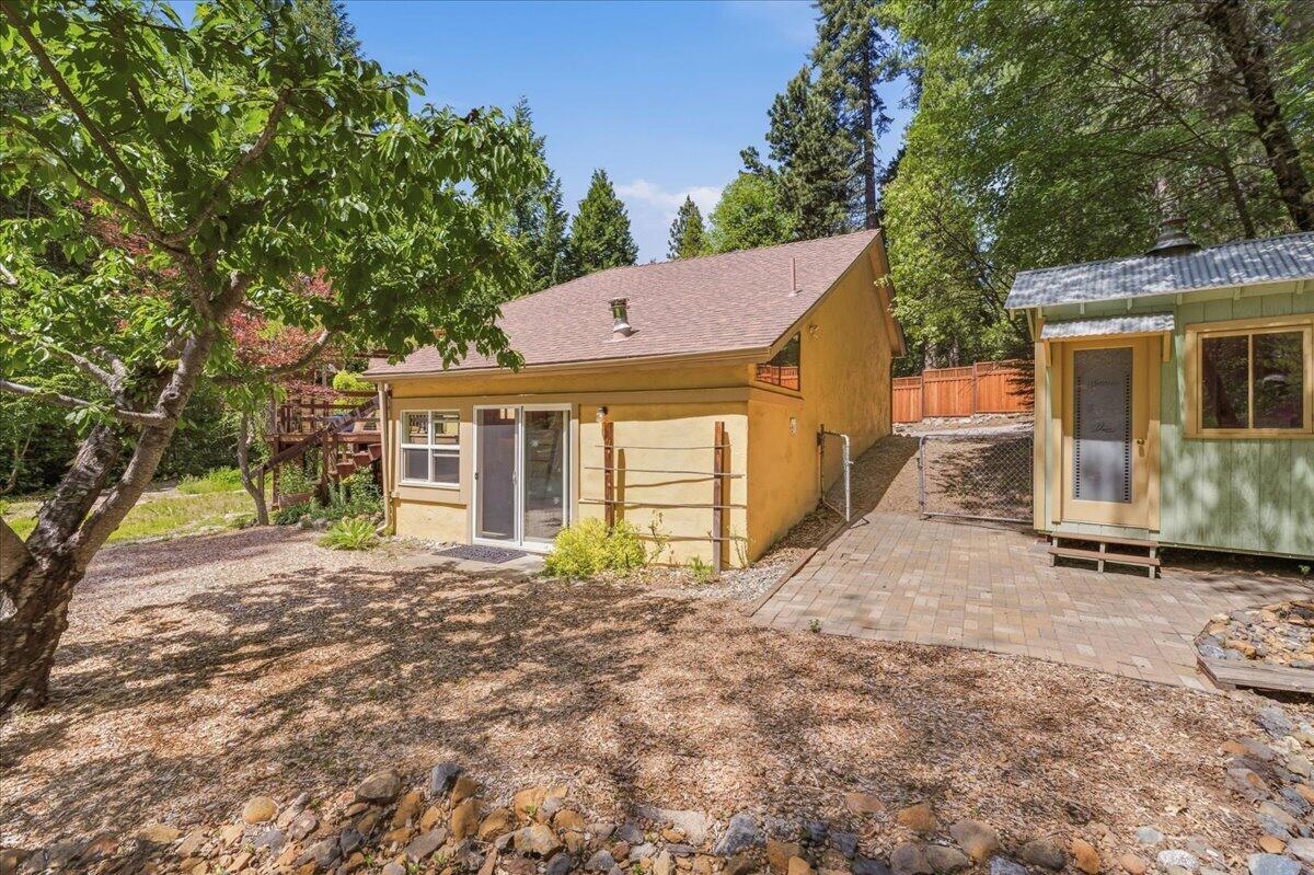 609 Eiler Road Mount Shasta, CA 96067 - Photo 32 of 35 a view of a house with a yard and pathway