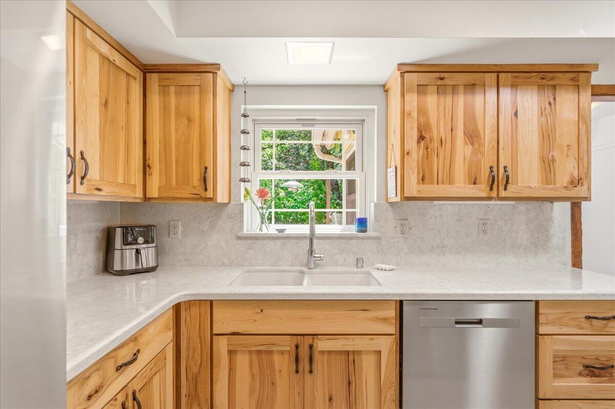 609 Eiler Road Mount Shasta, CA 96067 - Photo 8 of 35 a kitchen with stainless steel appliances a sink a refrigerator and window