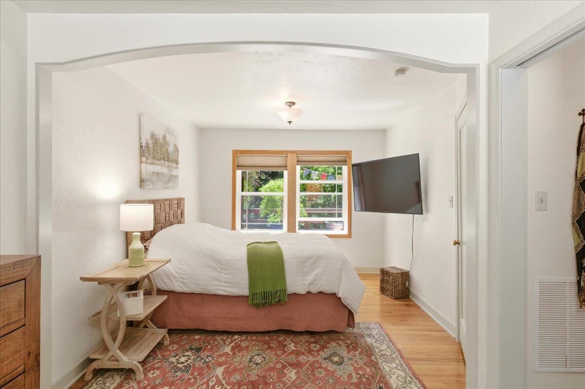 609 Eiler Road Mount Shasta, CA 96067 - Photo 10 of 35 a bedroom with a bed and a window