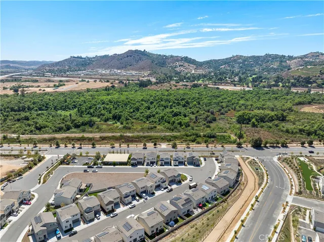a view of a city with mountains
