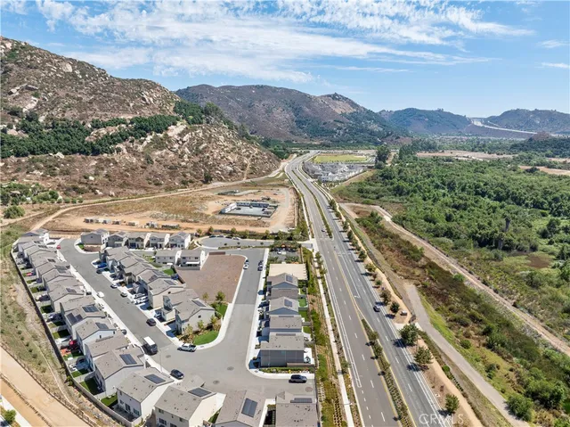 a view of city with ocean