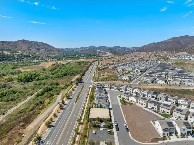 an aerial view of residential house and outdoor space