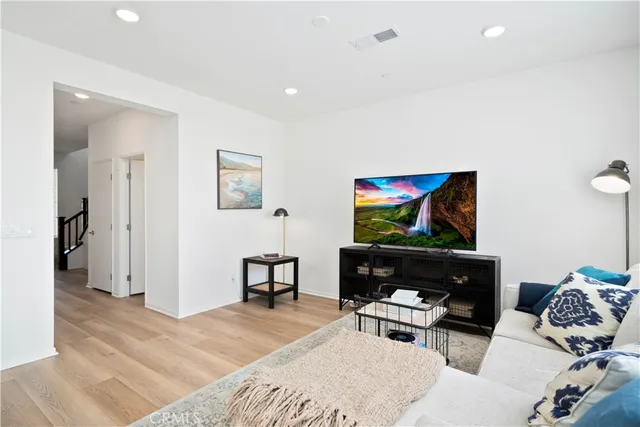 a living room with furniture and a couch