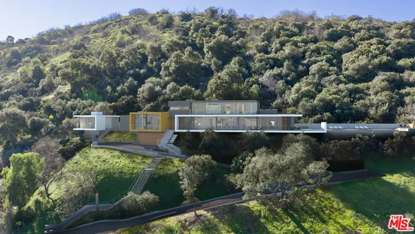 a view of a house with a mountain view