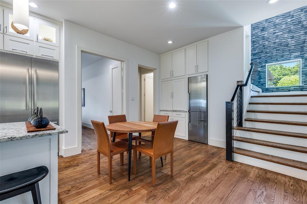 3755 Northview Lane Dallas, TX 75229 - Photo 14 of 36 a view of a dining room with furniture and wooden floor