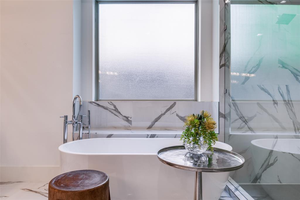 3755 Northview Lane Dallas, TX 75229 - Photo 21 of 36 a bathroom with a sink and a mirror