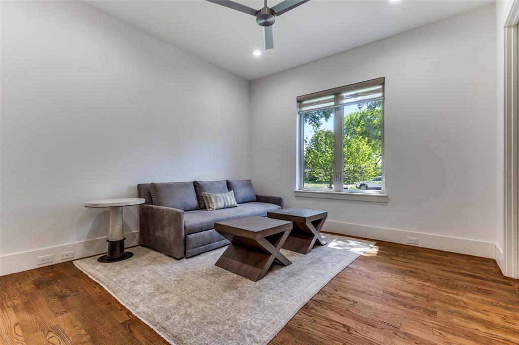 3755 Northview Lane Dallas, TX 75229 - Photo 26 of 36 a living room with furniture and a window