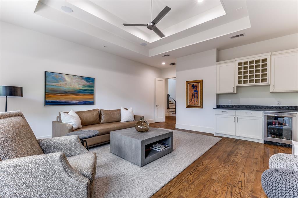 3755 Northview Lane Dallas, TX 75229 - Photo 30 of 36 a living room with furniture and a kitchen view