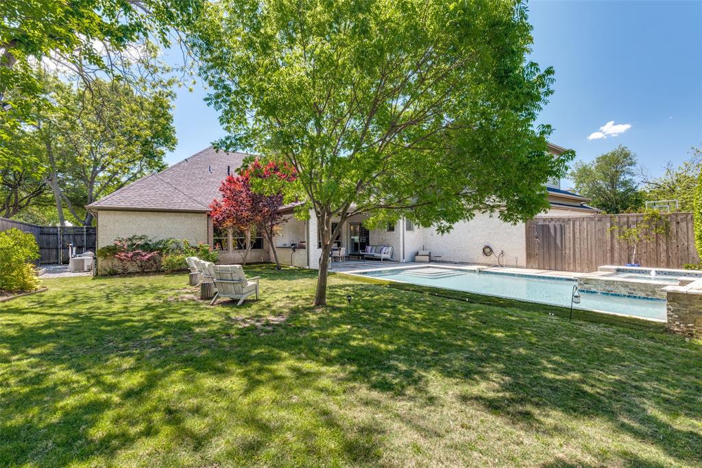 3755 Northview Lane Dallas, TX 75229 - Photo 35 of 36 a view of a house with a yard patio and fire pit