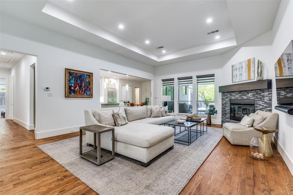 3755 Northview Lane Dallas, TX 75229 - Photo 4 of 36 a living room with furniture and a fireplace