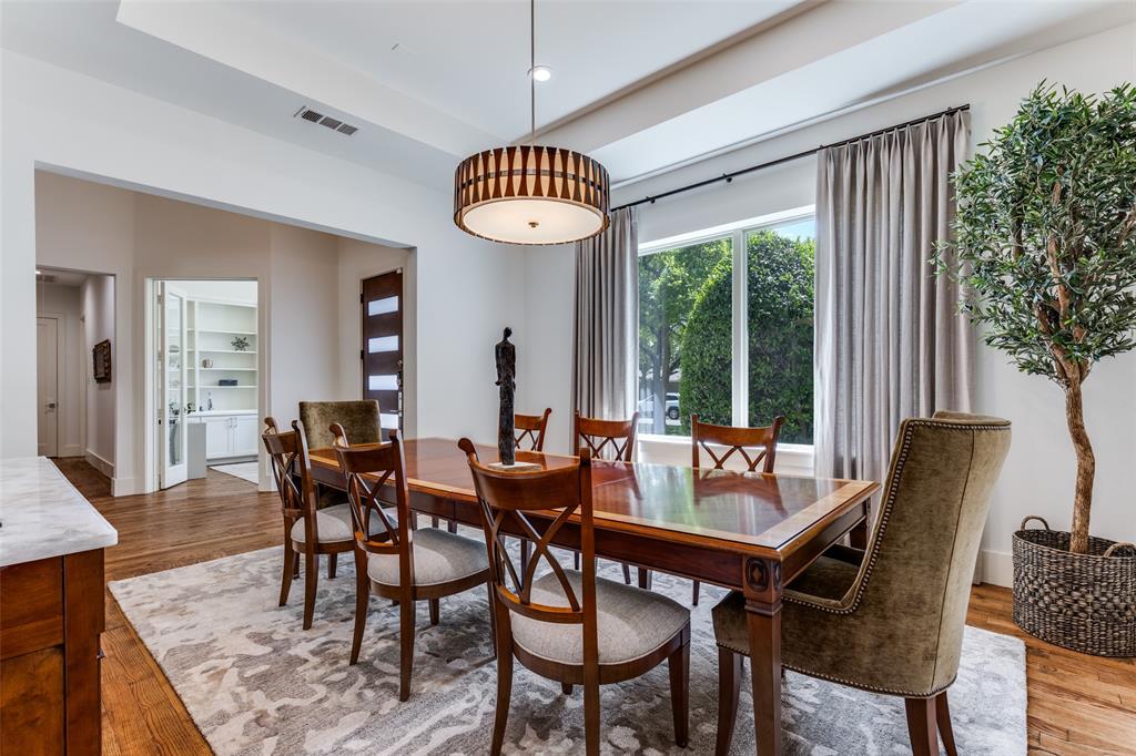 3755 Northview Lane Dallas, TX 75229 - Photo 5 of 36 a view of a dining room with furniture window and wooden floor