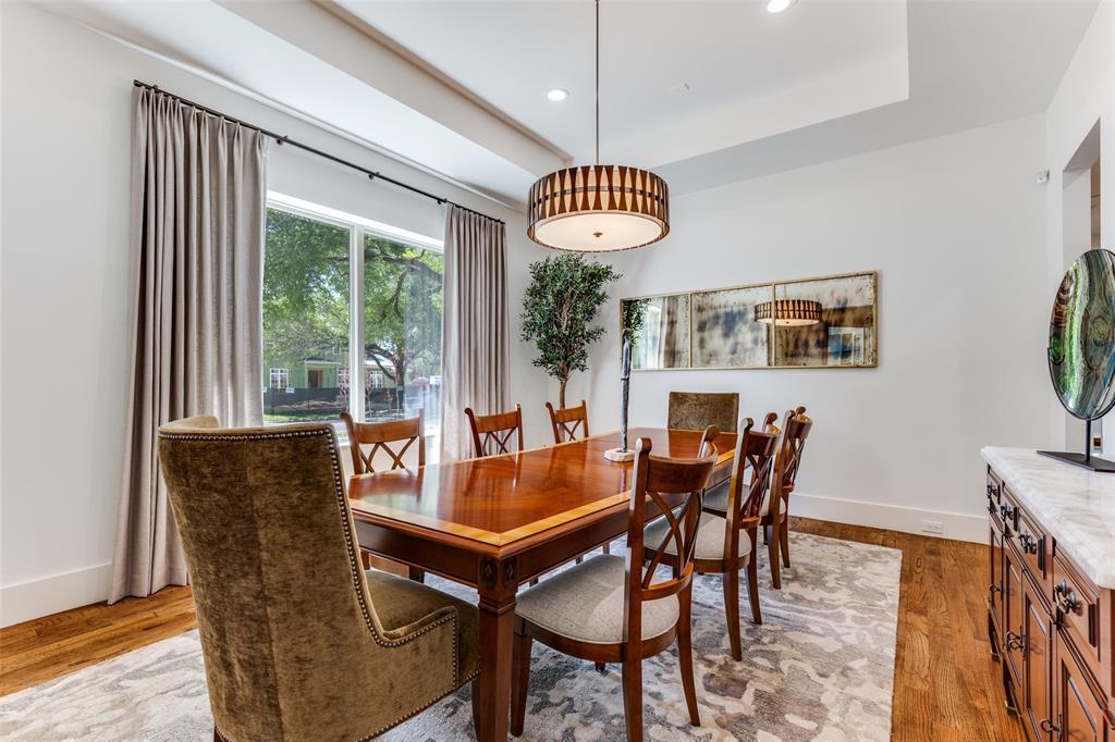 3755 Northview Lane Dallas, TX 75229 - Photo 6 of 36 a outdoor dining room with furniture a rug and a large window