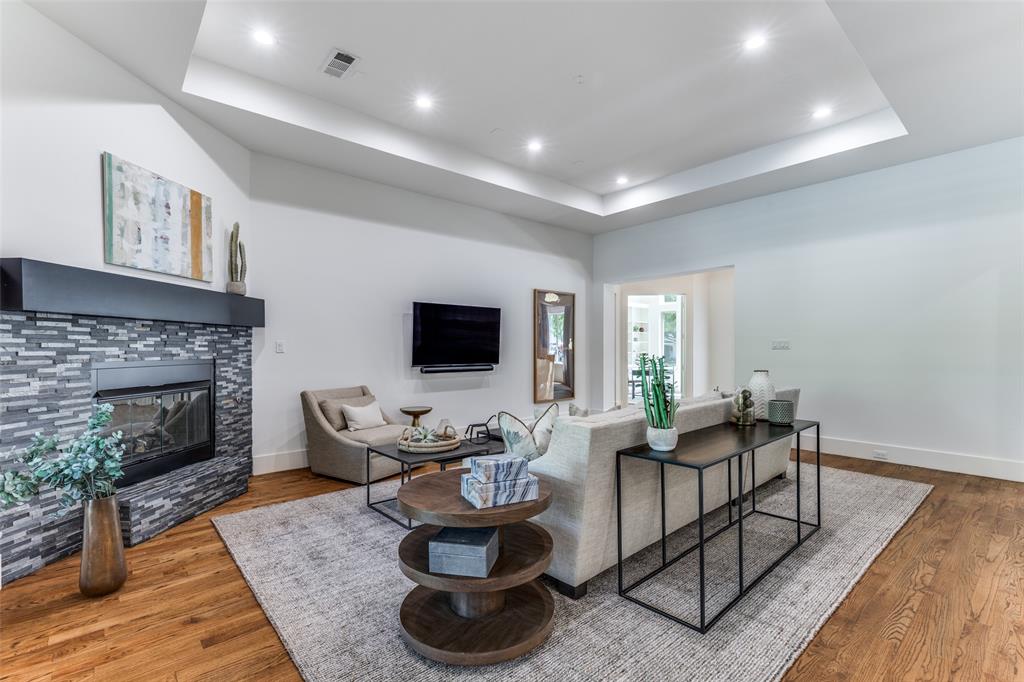 3755 Northview Lane Dallas, TX 75229 - Photo 9 of 36 a living room with furniture and a fireplace