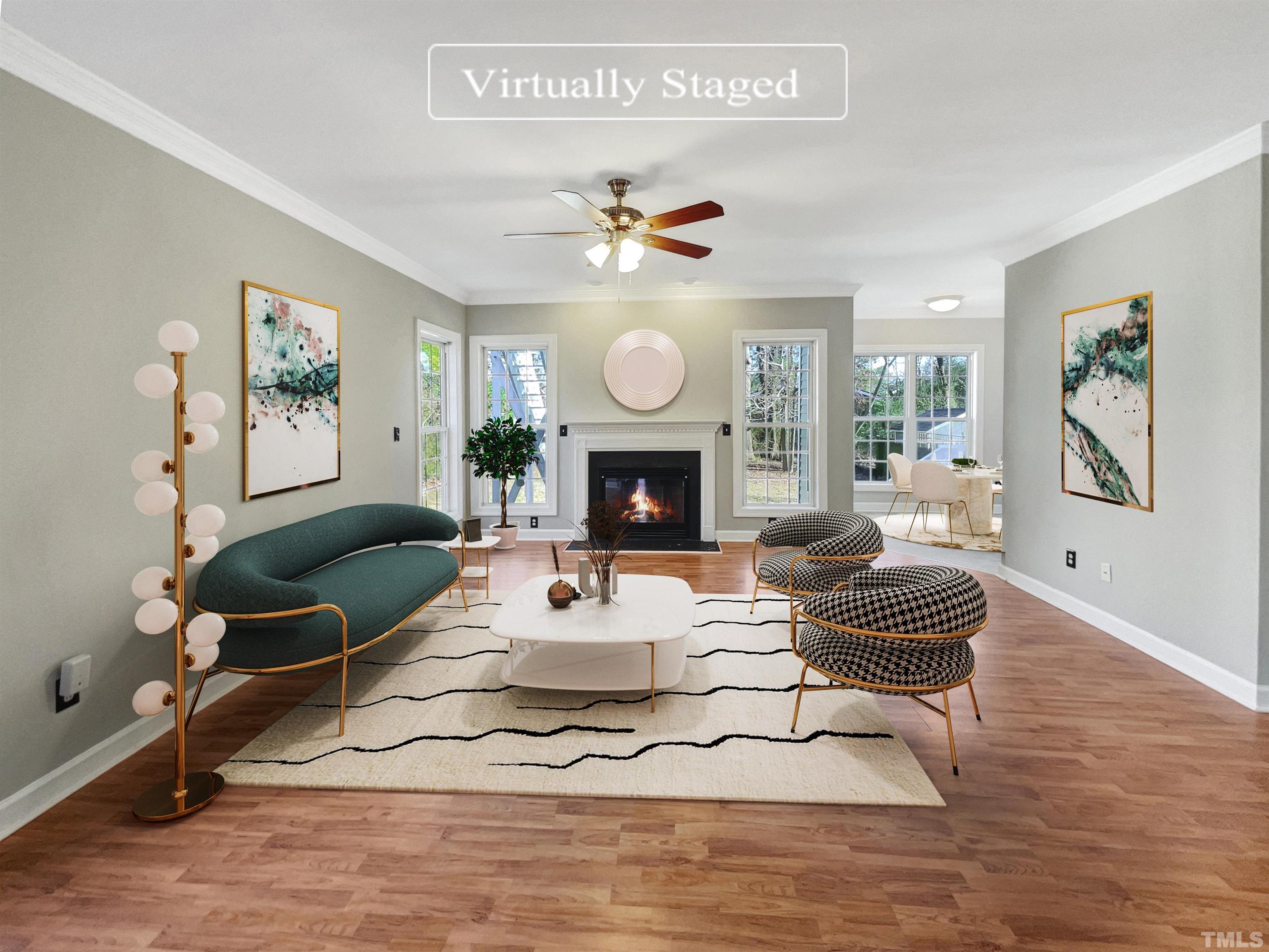 2716 Denbel Circle Raleigh, NC 27604 - Photo 3 of 19 a living room with furniture a fireplace and a large window