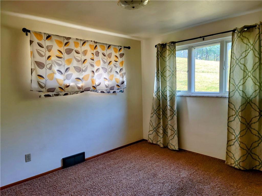 196 Valley Road Eighty Four, PA 15330 - Photo 10 of 16 a view of an empty room with a window