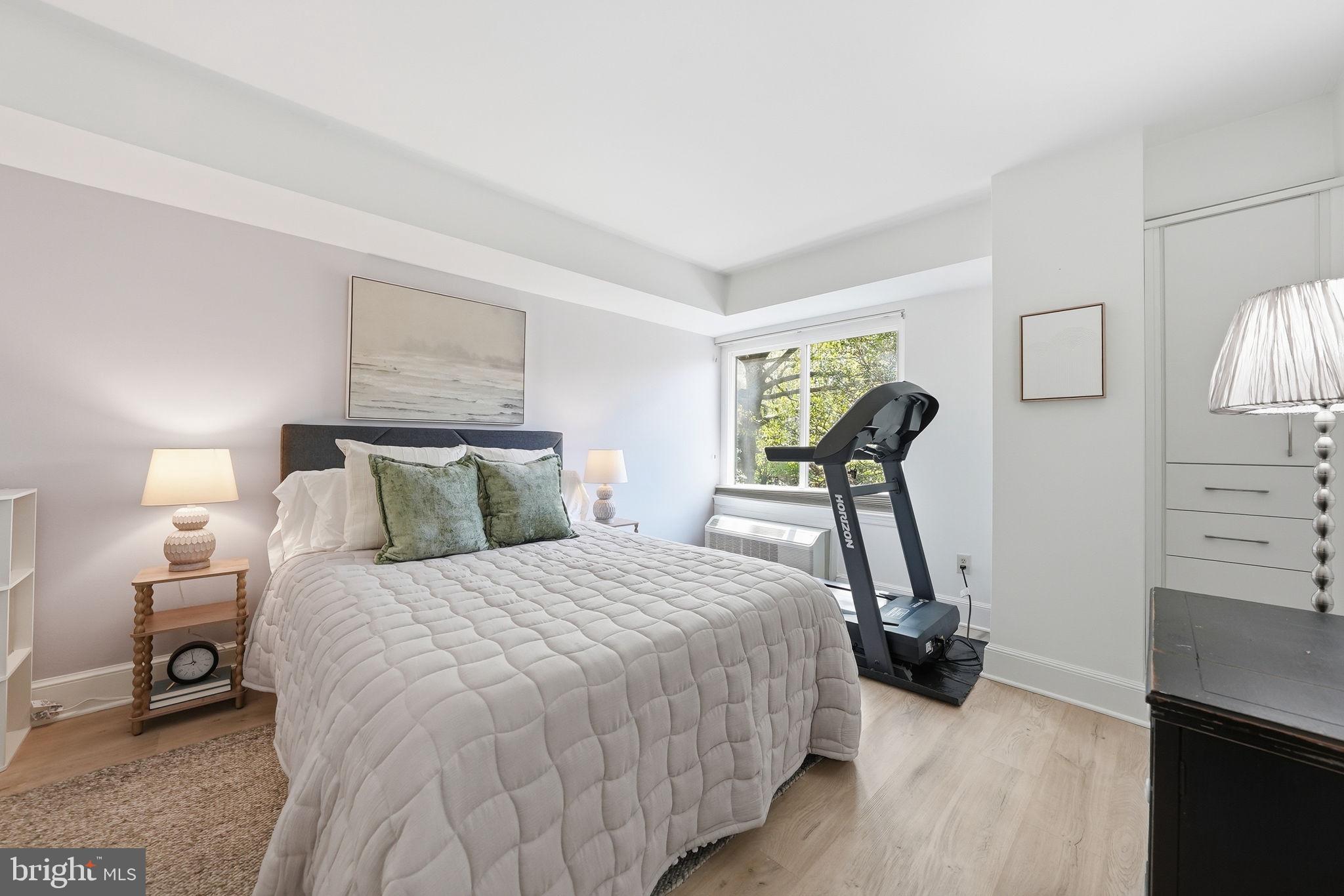 1825 T Street Northwest, Unit 207 Washington, DC 20009 - Photo 14 of 22 a bedroom with double bed and a window