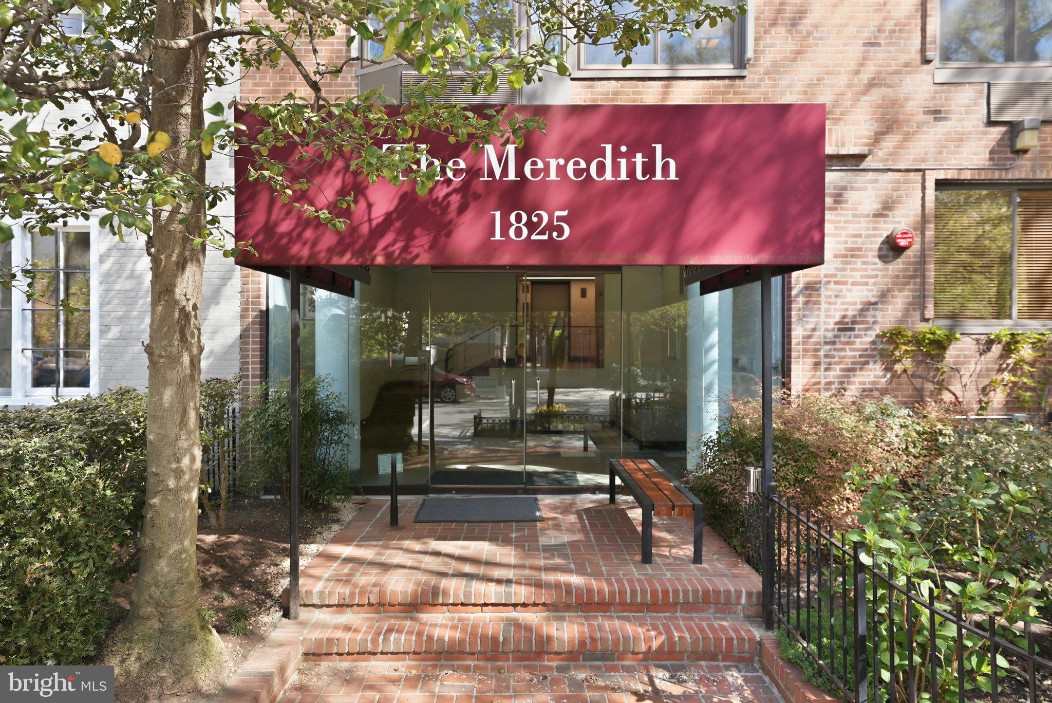 1825 T Street Northwest, Unit 207 Washington, DC 20009 - Photo 20 of 22 a sign on the side of a building