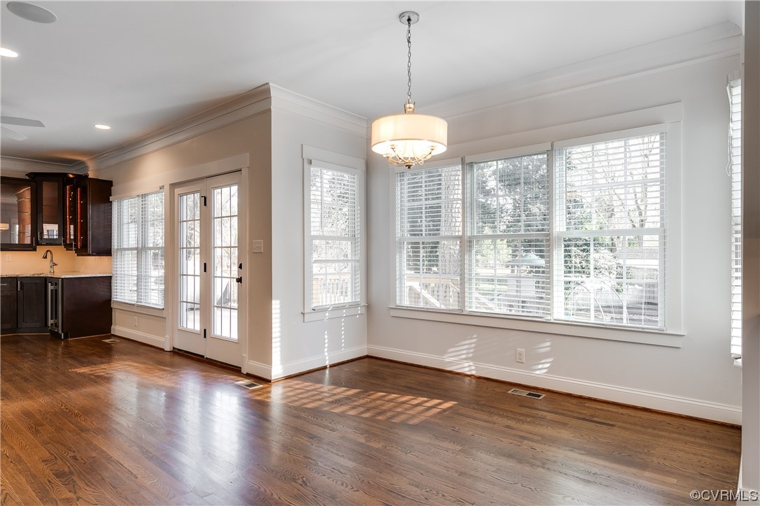 7203 Pinetree Road Henrico, VA 23229 - Photo 13 of 50 a view of an empty room with wooden floor and a window
