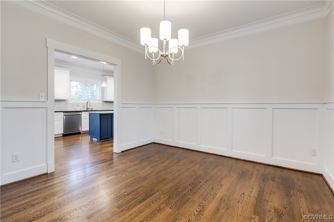 7203 Pinetree Road Henrico, VA 23229 - Photo 23 of 50 wooden floor in an empty room with a window
