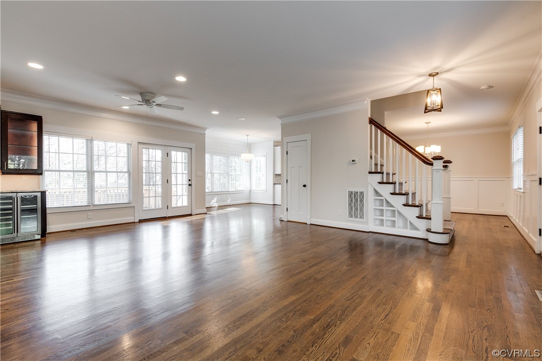 7203 Pinetree Road Henrico, VA 23229 - Photo 8 of 50 a view of an empty room with wooden floor and a window