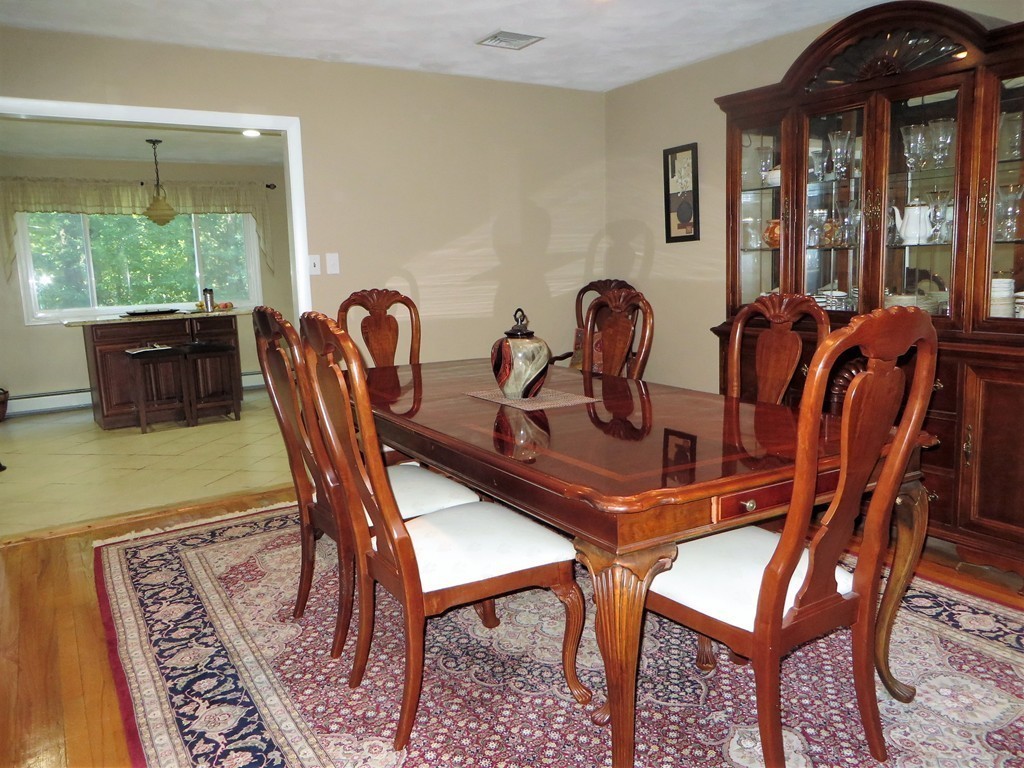24 Raynor Road Sudbury, MA 01776 - Photo 10 of 30 a dining room with furniture and window