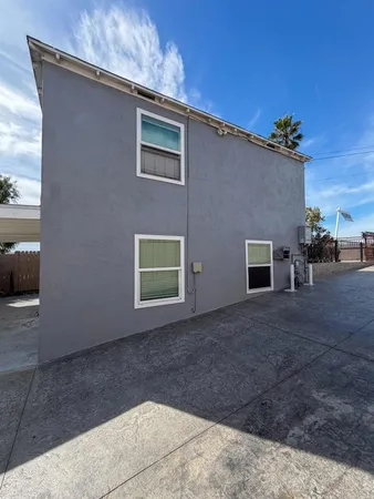 a view of a house with a patio