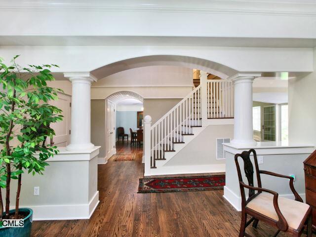 180 Signal Hill Road Wilton, CT 06897 - Photo 1 of 1 a view of entryway with livingroom and wooden floor