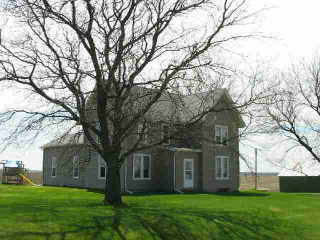 a view of house with yard